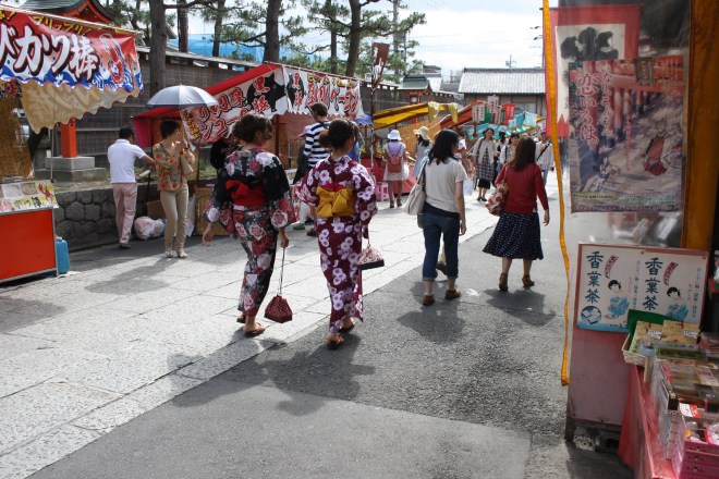 Walking from the train station to the main shrines and temple. Inari.